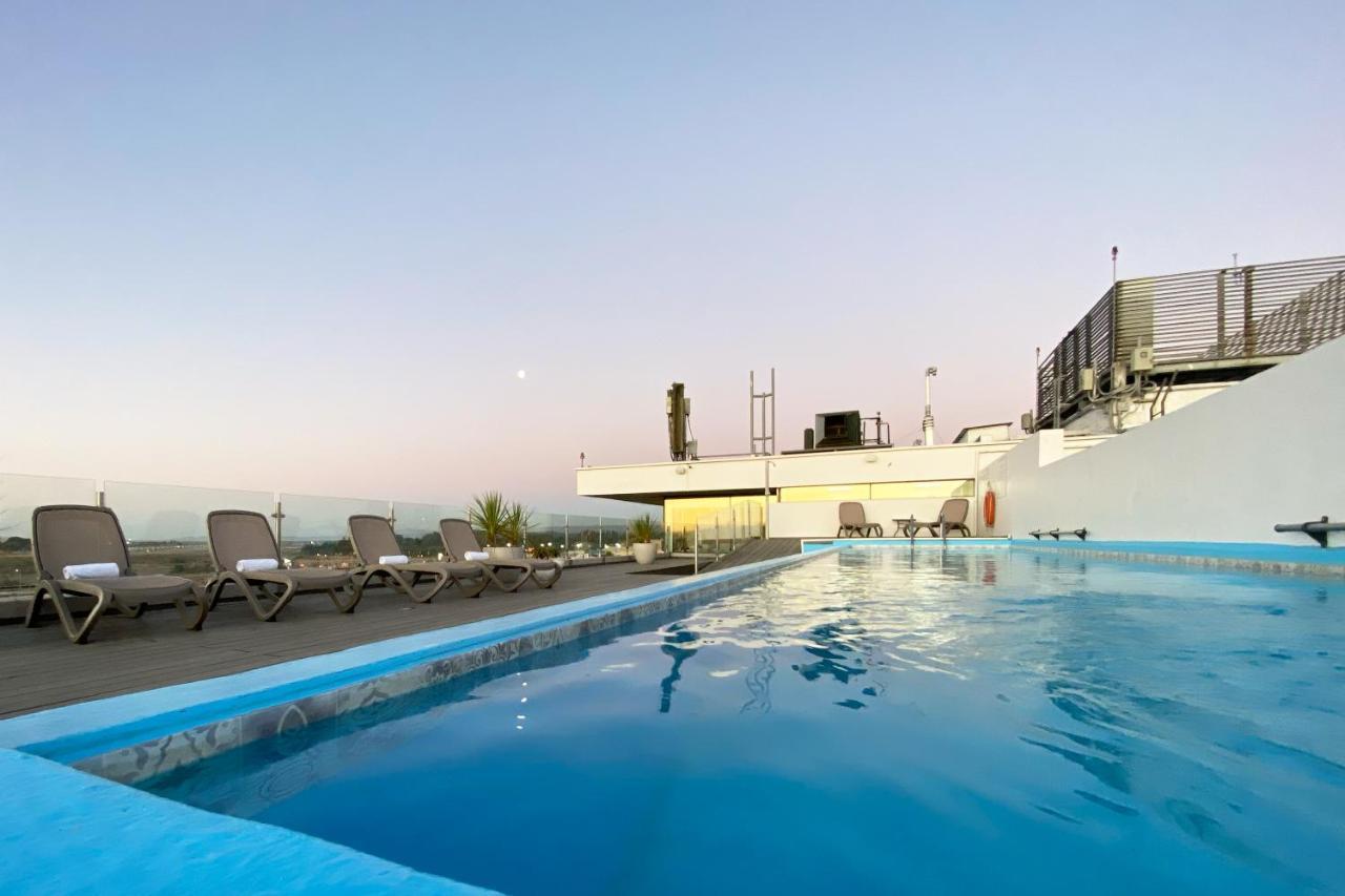 Wyndham Concepcion Pettra Hotel Buitenkant foto Rooftop pool
